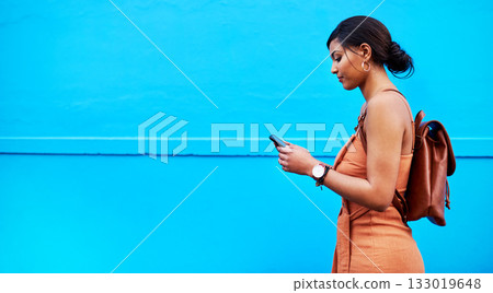 Space, phone and mockup with woman by wall for communication, social media and internet. Technology, connection and vacation with female mobile user in city for online, networking and travel app 133019648