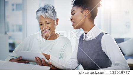 Coaching, tablet and help with business women in office for website, research and teamwork. Collaboration, idea and training with employees in meeting for technology, connection and brainstorming 133019777