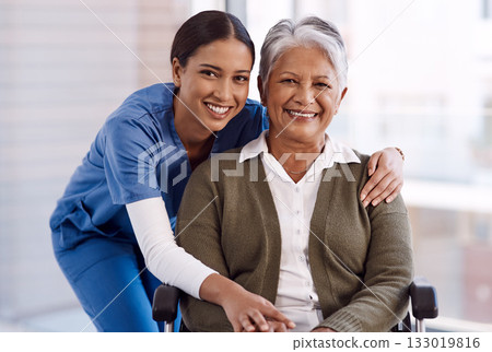 Portrait, healthcare or disability with a nurse and old woman in a wheelchair during a nursing home visit. Smile, medical or retirement with a happy female medicine professional and senior client 133019816