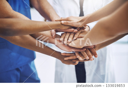 Teamwork, medical and support with hands of doctors for community, collaboration and solidarity. Medicine, healthcare and expert with closeup of people in meeting for target, goals and faith 133019853