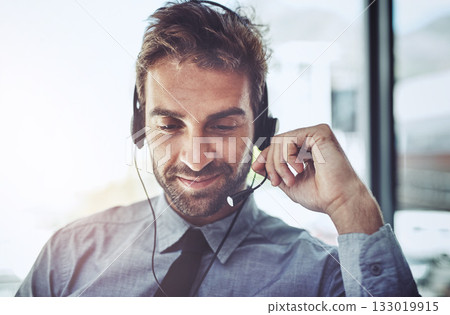 Man, call center and microphone to listen in office, help desk or talking for telemarketing job. Consultant, agent and crm with customer service, tech support or telecom with headphones, mic and job Man, call center and microphone to listen in office, help desk or talking for telemarketing job. Consultant, agent and crm with customer service, tech support or telecom with headphones, mic and job 133019915