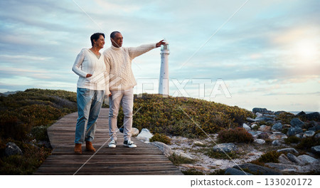 Travel, love and elderly couple pointing on boardwalk at beach, calm at a lighthouse against sunset sky. Senior, man with woman on ocean trip, holiday or vacation, happy and enjoying retirement Travel, love and elderly couple pointing on boardwalk at beach, calm at a lighthouse against sunset sky. Senior, man with woman on ocean trip, holiday or vacation, happy and enjoying retirement 133020172