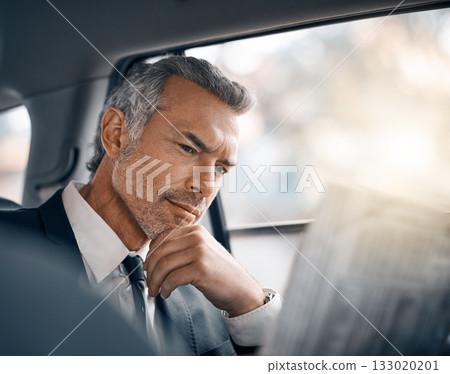 Man, reading newspaper and car for business travel, journey or drive while thinking of news. Professional male person with media paper in passenger seat for work with luxury transportation or a taxi 133020201