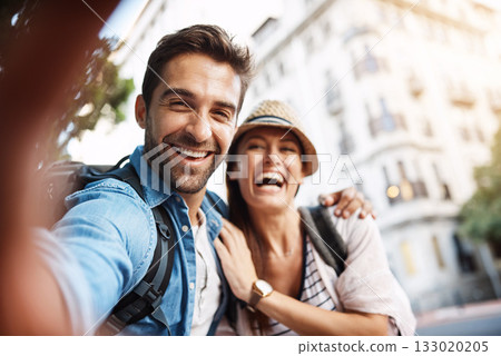Tourist, selfie and happy couple for travel on city street for holiday memory and happiness. Face of man and woman outdoor for outdoor adventure, journey or vacation for freedom or funny portrait 133020205