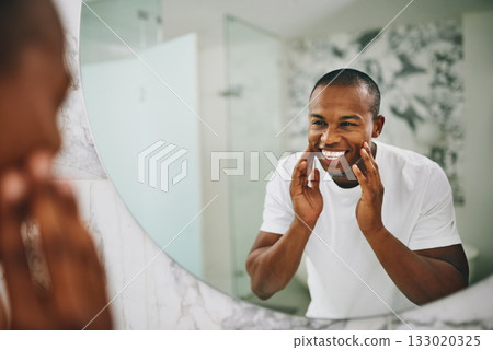 Happy, morning and mirror with black man in bathroom for beauty, skincare and grooming. Cleaning, hygiene and self care with reflection of male person at home for facial, natural and wellness Happy, morning and mirror with black man in bathroom for beauty, skincare and grooming. Cleaning, hygiene and self care with reflection of male person at home for facial, natural and wellness 133020325