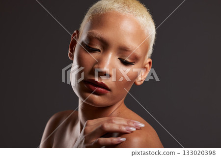 Beauty, makeup and face of black woman with eyes closed in dark studio with platinum hair isolated on grey background. Art aesthetic, cosmetics and beautiful African model with glowing skin facial. 133020398
