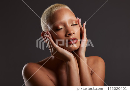 Beauty, makeup and skincare, black woman with cosmetics in dark studio with platinum hair style isolated on grey background. Art, aesthetic and relax, African model in skin glow and luxury spa facial Beauty, makeup and skincare, black woman with cosmetics in dark studio with platinum hair style isolated on grey background. Art, aesthetic and relax, African model in skin glow and luxury spa facial 133020401