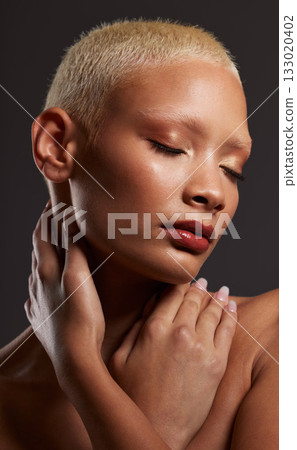 Face of black woman, dark studio and makeup, platinum hair and beauty isolated on grey background. Skincare, art aesthetic and cosmetics, and beautiful African model in skin glow and edgy spa facial. 133020402