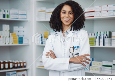 Healthcare, smile and portrait of woman in pharmacy, and happy to help with advice on prescription drugs. Confidence, medicine and medical professional or pharmacist for health and wellness. Healthcare, smile and portrait of woman in pharmacy, and happy to help with advice on prescription drugs. Confidence, medicine and medical professional or pharmacist for health and wellness. 133020465