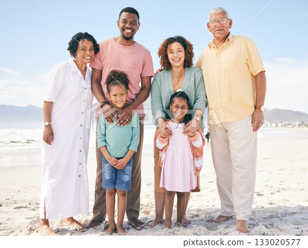Family at beach, portrait and generations, happy people relax outdoor with grandparents, parents and kids. Happiness, smile and travel, love and care with relationship and bond on vacation in Bali 133020577