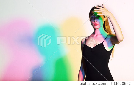 Light, beauty and fashion with woman and cover for creative, aesthetic or neon glow. Kaleidoscope, cosmetics and disco with model and cmyk color shadows for designer, art or party on white background Light, beauty and fashion with woman and cover for creative, aesthetic or neon glow. Kaleidoscope, cosmetics and disco with model and cmyk color shadows for designer, art or party on white background 133020662