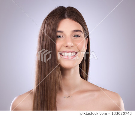 Beauty, face portrait and hair care of woman in studio isolated on a gray background. Natural cosmetics, smile and happy female model with salon treatment for healthy keratin, balayage and hairstyle. 133020743