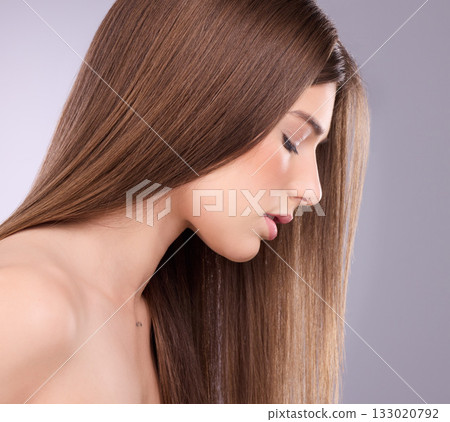 Profile, beauty and hair care of woman with eyes closed in studio isolated on a gray background. Face makeup, cosmetics or female model with salon treatment for healthy keratin, balayage or hairstyle 133020792