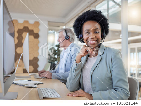 Help desk, smile and portrait of confident black woman at computer with headset at call center. Customer service consultant at online crm office, leader at advisory agency with diversity and success. Help desk, smile and portrait of confident black woman at computer with headset at call center. Customer service consultant at online crm office, leader at advisory agency with diversity and success. 133021144