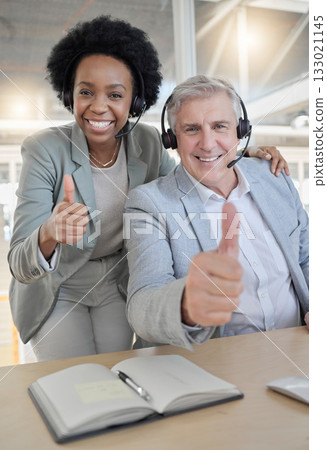 Customer support, thumbs up and portrait of black woman and man happy at desk in office. Contact us, help desk and teamwork with smile and notebook at advisory agency for crm training at call center. Customer support, thumbs up and portrait of black woman and man happy at desk in office. Contact us, help desk and teamwork with smile and notebook at advisory agency for crm training at call center. 133021145