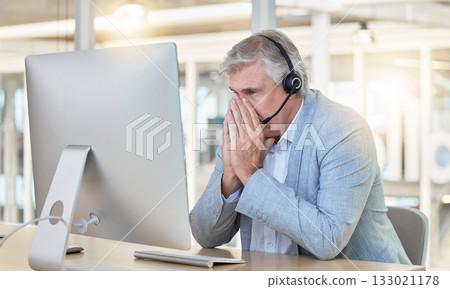 Call center, customer service and anxiety with a consultant man suffering from stress while working in the office. Crm, support or burnout with a senior male telemarketing working feeling overwhelmed Call center, customer service and anxiety with a consultant man suffering from stress while working in the office. Crm, support or burnout with a senior male telemarketing working feeling overwhelmed 133021178
