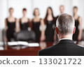 Boss in front of employees 133021722