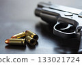 A pistol and ammunition. 133021724