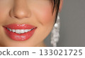 Beautiful female smile with beautiful teeth close-up. 133021725