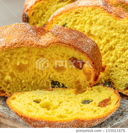 Freshly baked sweet Easter bread with raisins and sugar topping, close up 133021878