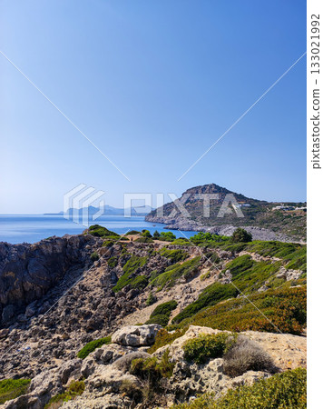 A Breathtakingly Stunning Coastal Landscape Featuring Rocky Cliffs and Crystal Clear Water A Breathtakingly Stunning Coastal Landscape Featuring Rocky Cliffs and Crystal Clear Water 133021992