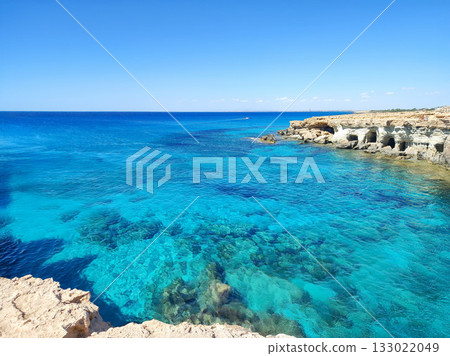 A Serene Coastal View Featuring Crystal Clear Water Perfect for Relaxation and Exploration 133022049