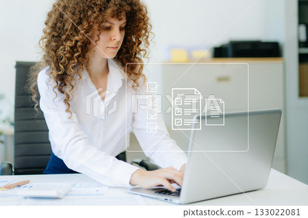 E-document management Paperless workplace, e-signing, electronic signature, document management  businesswomen signs an electronic document 133022081