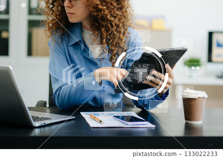 Woman using chatbot in computer and tablet smart intelligence Ai.Chat with AI Artificial Intelligence, developed by OpenAI generate. Woman using chatbot in computer and tablet smart intelligence Ai.Chat with AI Artificial Intelligence, developed by OpenAI generate. 133022233
