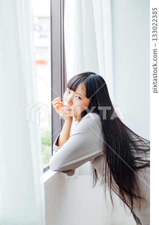 Gloomy morning image of a young woman in a bad mood 133022385