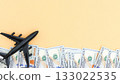 Airplane on Money Planning Travel and Budgeting for Vacation Expenses. Dream of Flying 133022535