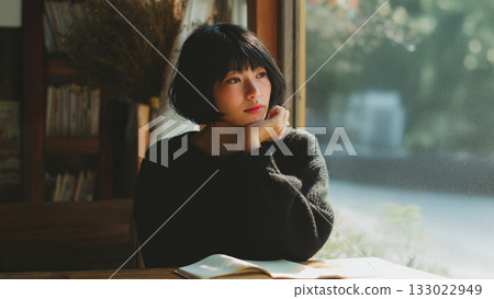Woman relaxing in a cafe 133022949