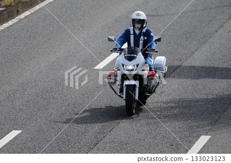 Image of a police motorcycle on patrol Image of a police motorcycle on patrol 133023123