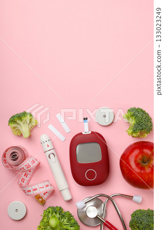 Tools for diabetes management and fresh foods displayed Tools for diabetes management and fresh foods displayed 133023249