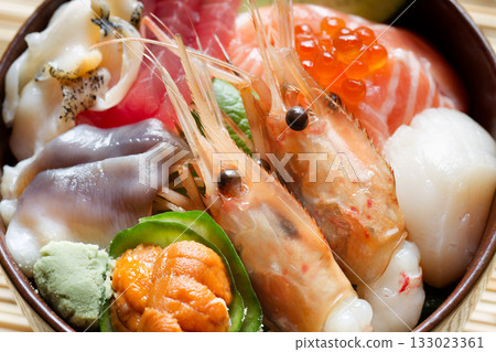 Bowl of rice topped with sashimi Bowl of rice topped with sashimi 133023361