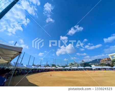 Under the blue sky, cheering section at a sports day in the junior high school playground Under the blue sky, cheering section at a sports day in the junior high school playground 133024323