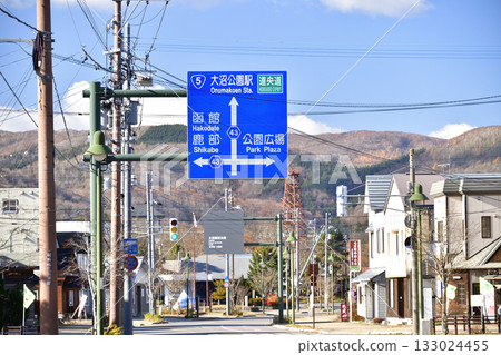 Photographing a landscape with road signs in Nanae Town, Hokkaido in late autumn 133024455