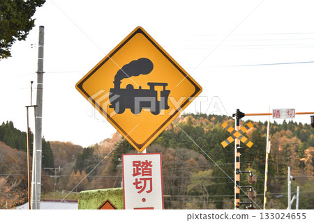 Photographing a landscape with road signs in Yakumo Town, Hokkaido in late autumn Photographing a landscape with road signs in Yakumo Town, Hokkaido in late autumn 133024655