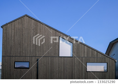 Housing image: Newly built house with burnt cedar exterior 133025290