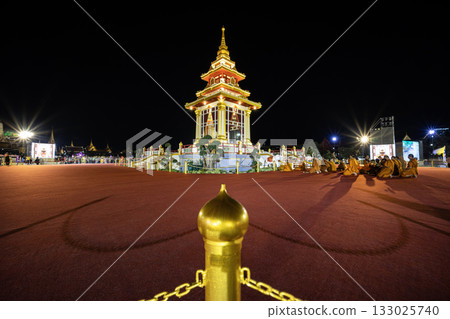Buddha Tooth Relic Temple and Museum at Sanam Luang with the grand palace in the background during night time. 133025740