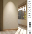 Empty white wall along the parquet floor corridor or hallway of a house with wooden frame windows. 133026976