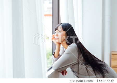 Gloomy morning image of a grumpy young woman 133027232