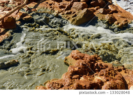 Toxic gold mining residual waters from gold mine flowing and polluting environment 133028048