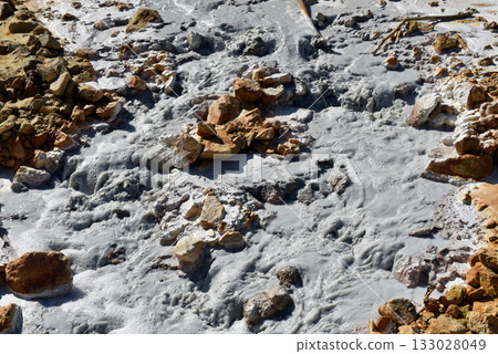 Toxic gold mining residual waters from gold mine flowing and polluting environment 133028049