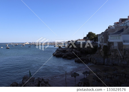 Cascais Coastline View: Marina, Rocky Shore, and Beach 133029576