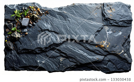 The surface contrasts with the rough pattern of the old black stone wall.The surface contrasts with the rough pattern of the old black stone wall. 133030438