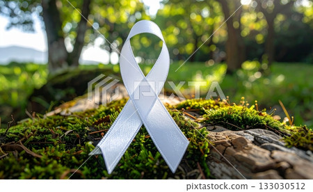 Fallen leaves with white ribbon symbol 133030512