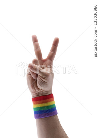 Victory hand with colorful rainbow LGBT wristband isolated on white background with clipping path 133030966
