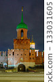 The Odoevsky Gate Tower of the Tula Kremlin with bright night illumination. A majestic view of a historic monument of Russian defensive architecture against a dark sky in Tula, Russia. 133031605