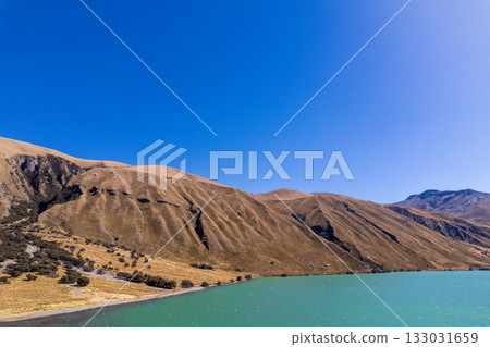 Aerial view of the Querococha lagoon, in the Ancash region. Aerial view of the Querococha lagoon, in the Ancash region. 133031659