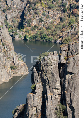 Majestic River Canyon Surrounded by Steep Cliffs Majestic River Canyon Surrounded by Steep Cliffs 133032152
